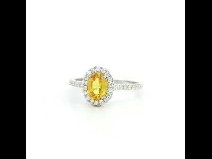 18K white gold oval yellow sapphire halo ring with diamond band and natural diamonds