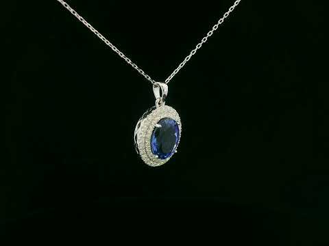 Oval Tanzanite pendant with two diamond halos