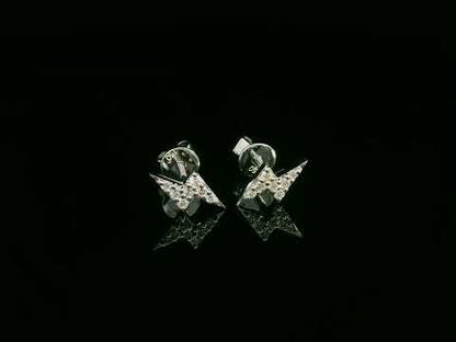 18K white gold geometric lightning bolt pavé diamond stud earrings – minimalist modern earrings by Emirates Diamonds.