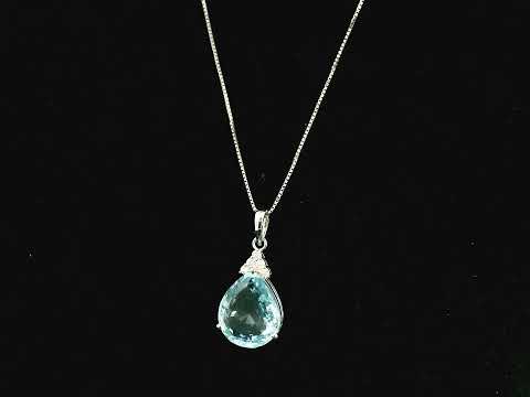 18K white gold pendant featuring a 10.82 carat natural pear-shaped aquamarine accented with 0.13 carat natural round brilliant diamonds. 