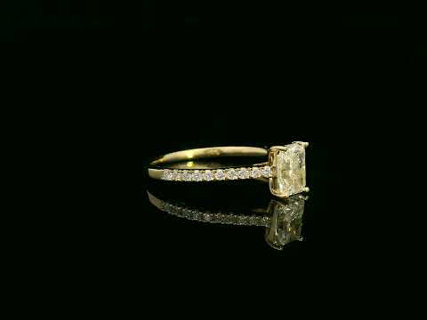 18K yellow gold radiant-cut diamond solitaire ring with pavé diamond band, 0.90 carat IGI certified center diamond and 0.21 carat accent diamonds by Emirates Diamonds
