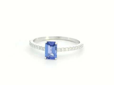 Emerald-cut Tanzanite ring in 18K white gold with diamond-accented band – 0.56ct center stone