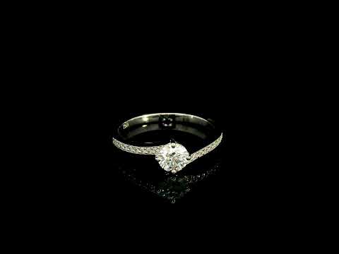 GIA certified round diamond engagement ring in 18K white gold with curved diamond band