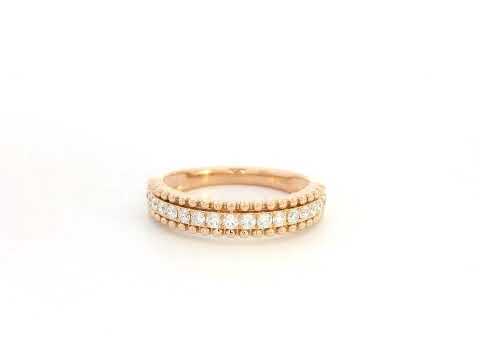 18K rose gold diamond eternity band ring with 0.35 carat round diamonds, minimal stacking wedding band by Emirates Diamonds.
