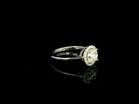 18K white gold round diamond halo engagement ring with a 0.98 carat IGI certified centre diamond and sparkling diamond halo.