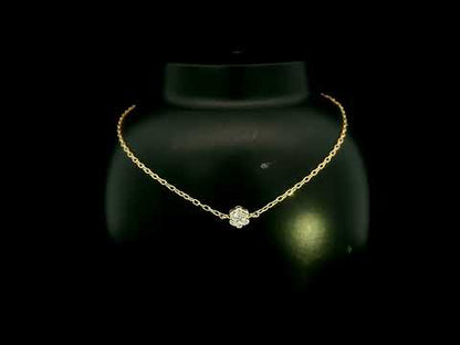 18K yellow gold diamond flower bracelet featuring a natural diamond floral motif on a delicate chain.