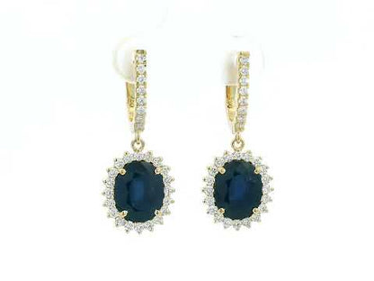 18K yellow gold earrings with 6.41ct oval blue sapphires and 0.91ct diamond sunburst halo design