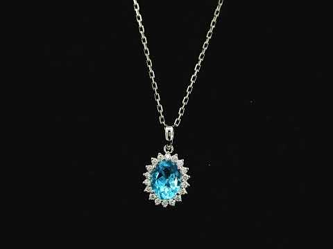 Swiss blue topaz and diamond halo pendant in 18K white gold – Emirates Diamonds