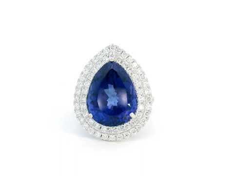 Pear-shaped tanzanite cocktail ring with double diamond halo in 18K gold