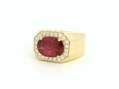 Men’s 18K yellow gold ruby ring with 3.06ct oval ruby and 0.34ct diamond octagonal halo – Emirates Diamonds