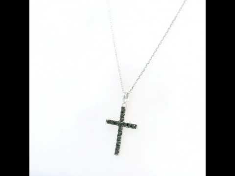 Black diamond cross pendant in 18K white gold set with round black diamonds in a slender cross design.