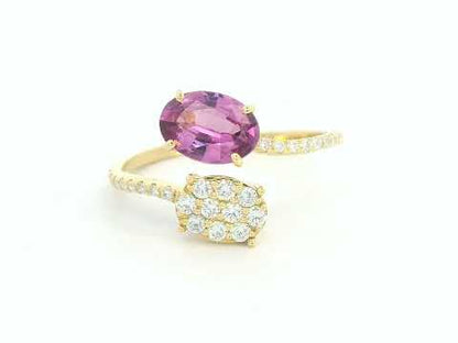 18K yellow gold oval rhodolite garnet bypass ring with pavé diamond accents, modern luxury design