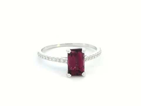 18K white gold ring featuring a 1.46-carat emerald-cut Rhodolite with 0.18 carats of diamonds on the band.