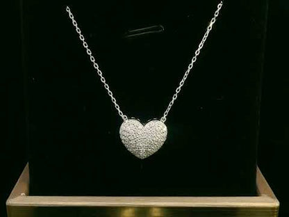 Diamond heart pendant necklace in 18K gold with 0.43 carat pavé diamonds

