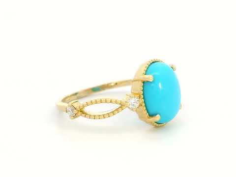 18K gold oval turquoise ring with diamond accents and vintage milgrain openwork design

