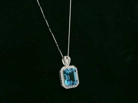 18K white gold Swiss blue topaz and diamond halo pendant necklace by Emirates Diamonds