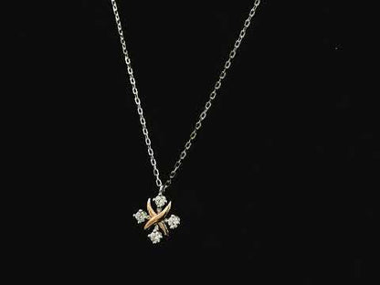 Two-tone diamond pendant necklace in 18K white and rose gold with 0.25 carats of natural diamonds by Emirates Diamonds