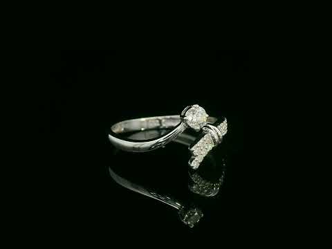 18K white gold diamond bypass ring with round center diamond and pavé side band – Emirates Diamonds