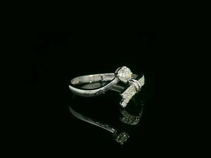 18K white gold diamond bypass ring with round center diamond and pavé side band – Emirates Diamonds