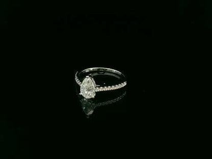 1.01 carat GIA certified pear diamond engagement ring in 18K white gold with pavé band by Emirates Diamonds Dubai