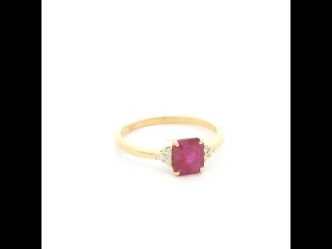 18K yellow gold emerald cut ruby ring featuring a 0.97 Carat natural ruby with sparkling natural diamond side accents.