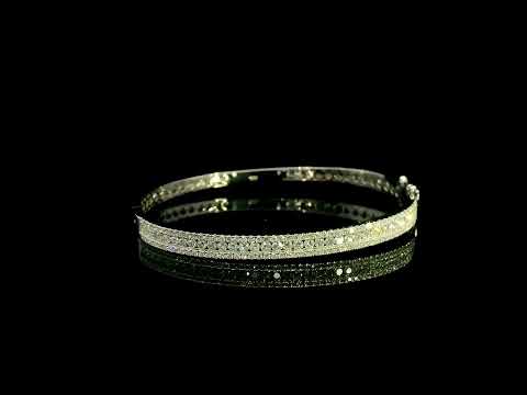 Three row diamond bangle in 18K white gold with parallel rows of round diamonds across the front.