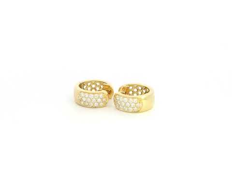 Diamond huggie hoop earrings in 18K yellow gold by Emirates Diamonds