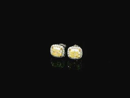 18K white gold fancy yellow cushion cut diamond halo stud earrings with GIA certified VS1 diamonds