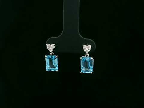 Swiss blue topaz and diamond stud earrings in 18K white gold by Emirates Diamonds.