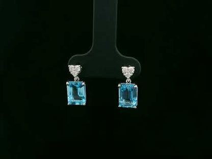 Swiss blue topaz and diamond stud earrings in 18K white gold by Emirates Diamonds.