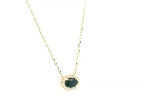 18K yellow gold sapphire and diamond halo pendant necklace with oval blue sapphire center stone