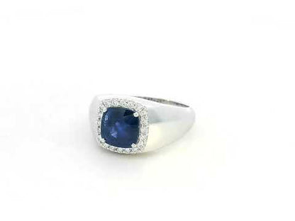 18K white gold men’s ring with 2.67ct cushion-cut blue sapphire and 0.30ct diamond halo.