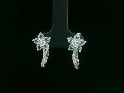 Aquamarine and diamond flower earrings in white gold