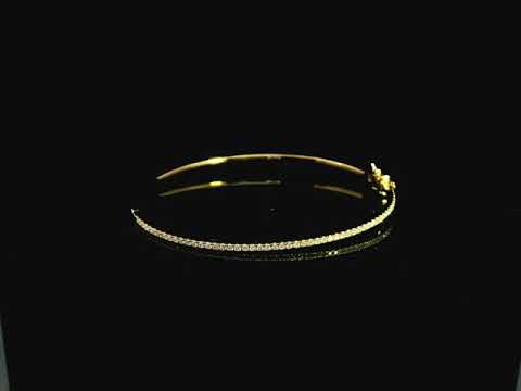 18K yellow gold diamond bangle featuring 0.54 carat natural diamonds in an elegant open bangle bracelet design.