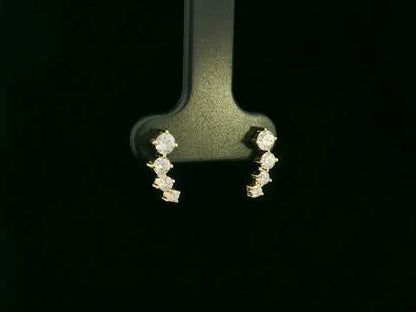 Diamond stud earrings in 18K yellow gold with 0.53 carat total diamond weight by Emirates Diamonds