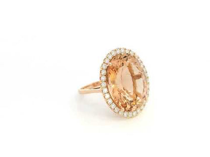 20.67 carat oval morganite diamond halo ring in 18K rose gold by Emirates Diamonds