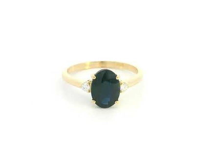 Oval sapphire and diamond ring in 18K yellow gold by Emirates Diamonds