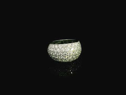 18K white gold wide dome ring featuring 3.21 carats of natural pavé-set diamonds with polished white gold shoulders.