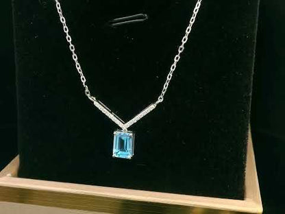 18K gold Blue Topaz necklace with 1.04 Ct emerald-cut Blue Topaz and 0.08 Ct diamonds, luxury gemstone necklace