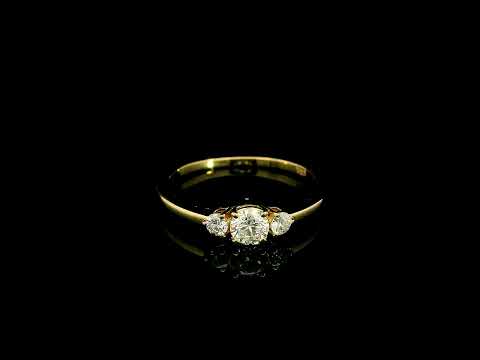 Three stone diamond ring in 18K yellow gold with graduated round brilliant diamonds
