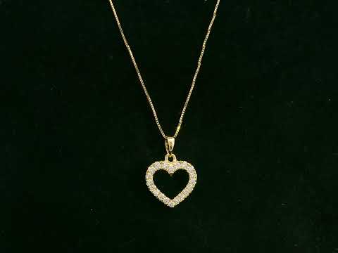 18K yellow gold diamond heart pendant with pavé-set diamonds, elegant open heart design by Emirates Diamonds.
