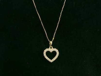 18K yellow gold diamond heart pendant with pavé-set diamonds, elegant open heart design by Emirates Diamonds.