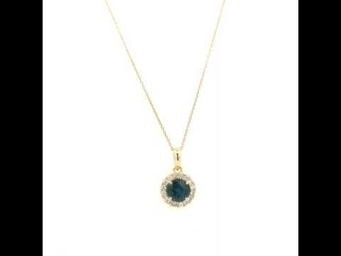 Round blue sapphire diamond halo pendant in 18K white gold.