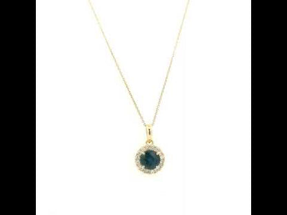 Round blue sapphire diamond halo pendant in 18K white gold.