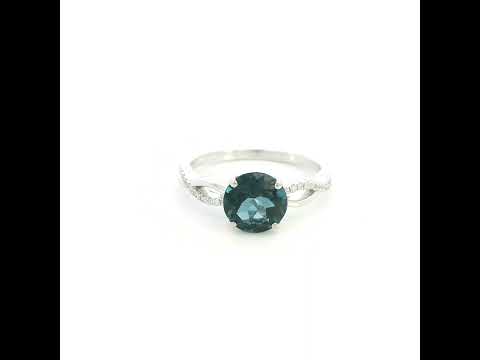London Blue Topaz diamond ring in 18K white gold with round blue topaz and diamond accented sculpted band