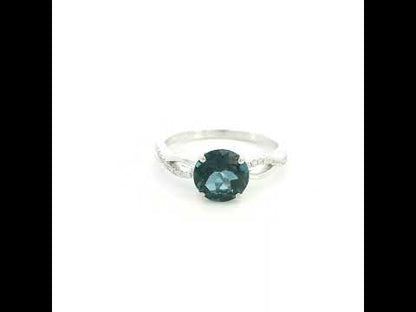 London Blue Topaz diamond ring in 18K white gold with round blue topaz and diamond accented sculpted band