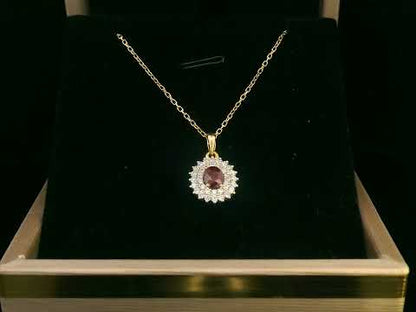 18K Gold Ruby and Diamond Halo Pendant – 0.29ct Oval Ruby, 0.28ct Diamonds