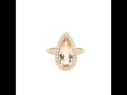 Morganite and Diamond Halo Ring in 18K Rose Gold. Pear Shaped Morganite