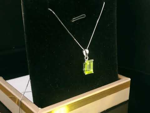 Luxury 18K white gold Peridot pendant, 1.66-carat vibrant green gemstone, elegant fine jewelry gift.