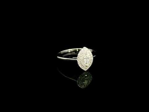 Marquise diamond halo engagement ring in 18K white gold with a marquise centre diamond surrounded by a sparkling diamond halo.